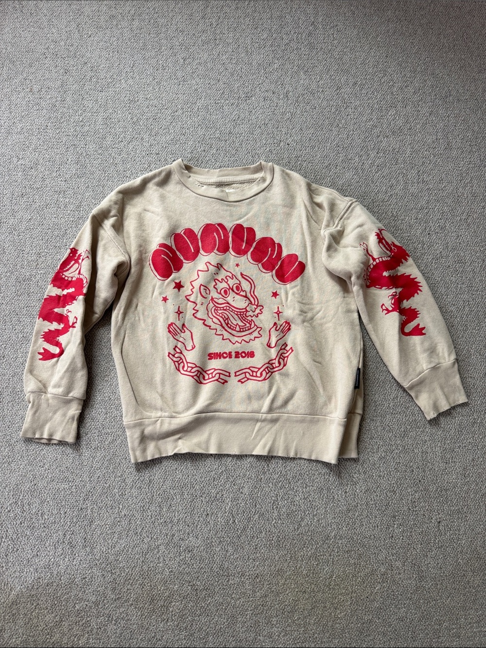 nununu Beige Crewneck Sweatshirt with Red Graphic Dragon